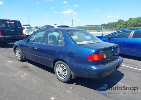 2002 Toyota Corolla Le из США, поврежденный, VIN 2T1BR12E52C558044